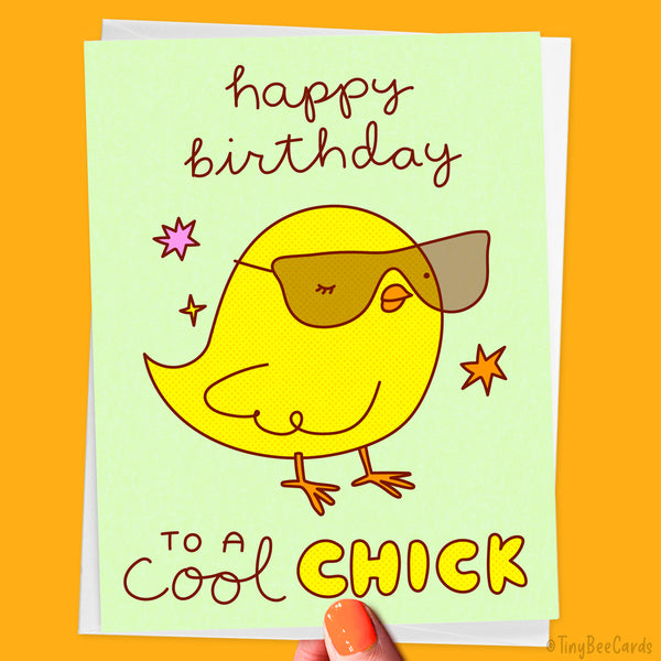 A hand drawn birthday card featuring an illustration of a cute yellow chick wearing sunglasses and winking and the text "Happy birthday to a Cool Chick"