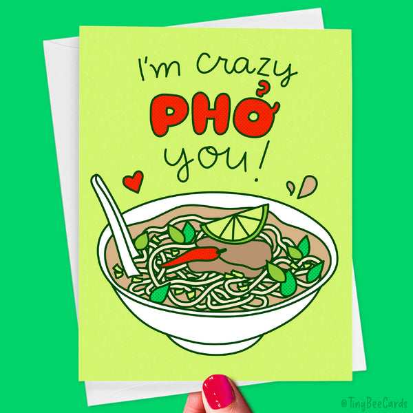 Card with a hand drawn illustration of a bowl of pho soup and text 'I'm crazy phô you!' on a green background