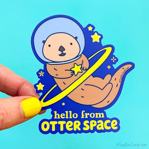 Cute Otter Vinyl Sticker with an otter and the text "Hello from Otter Space"
